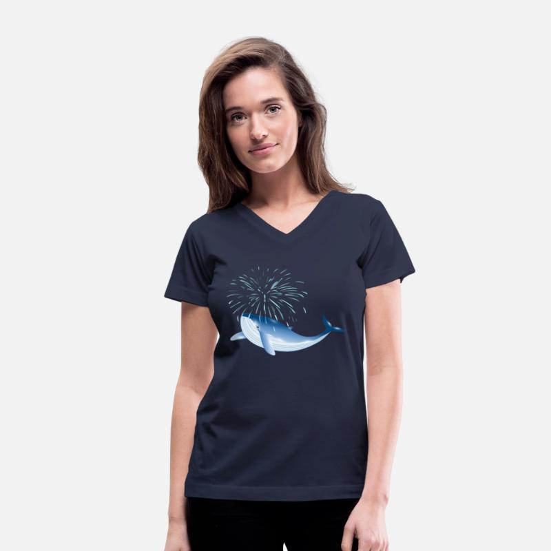bright blue whale fish in the ocean with fountain