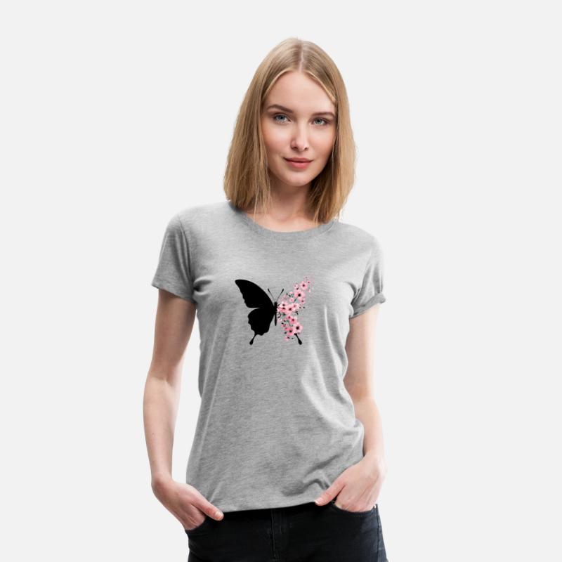 Butterfly Silhouette with Blossoming Flowers